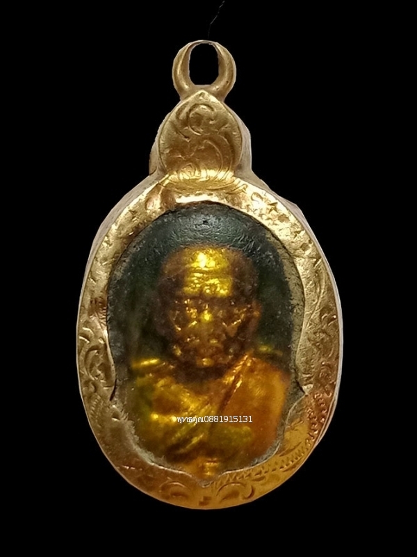 เหรียญเม็ดแตงหลวงพ่อทวดเลี่ยมทอง วัดช้างให้ ปัตตานี ปี2522